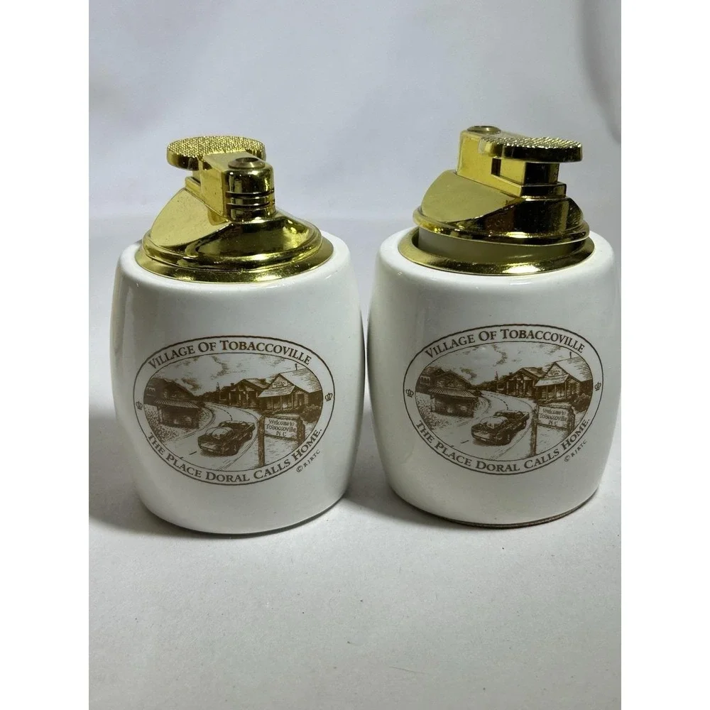 Lot of 2 Vintage Village of Tobaccoville NC North Carolina Doral Lighter NOS